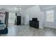This bedroom features hardwood floors and windows at 2412 Chartwell Ln, Graham, NC 27253
