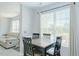 Cozy dining area with an adjacent living room for easy entertaining at 2412 Chartwell Ln, Graham, NC 27253