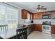 Kitchen features stainless steel appliances, lots of cabinets, and eat-in dining at 2412 Chartwell Ln, Graham, NC 27253