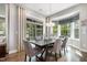 Bright dining area with large windows providing abundant natural light and scenic views at 2421 Beckwith Rd, Apex, NC 27523