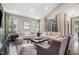 Bright and airy living room featuring hardwood floors, recessed lighting, and neutral decor at 2421 Beckwith Rd, Apex, NC 27523