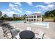 Community pool area featuring a splash fountain and plenty of seating at 2421 Beckwith Rd, Apex, NC 27523