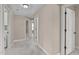 Upstairs hallway with access to the laundry and other rooms at 2712 Peachleaf St, Raleigh, NC 27614