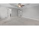 Spacious main bedroom featuring carpet flooring and ensuite bathroom at 2712 Peachleaf St, Raleigh, NC 27614