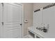 Hallway with coat rack, shelf, bench, and exterior door at 2712 Peachleaf St, Raleigh, NC 27614