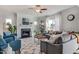 Cozy living room with a fireplace, ample seating, and natural light at 272 Alice Trace Place, Angier, NC 27501