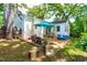 Serene backyard patio featuring an outdoor dining set and comfortable seating at 2725 Bedford Ave, Raleigh, NC 27607