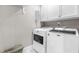 Practical laundry room equipped with Maytag washer and dryer, offering convenience and efficiency for chores at 2725 Bedford Ave, Raleigh, NC 27607