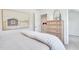 Calm bedroom featuring a dresser, artwork, and neutral tones at 287 Alice Trace Place, Angier, NC 27501