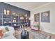 Comfortable living room with stylish shelving, modern decor, and ample light at 287 Alice Trace Place, Angier, NC 27501
