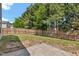 A spacious, grass backyard enclosed by a wooden fence offering privacy and room for outdoor activities and gatherings at 3040 Varcroft Rd, Knightdale, NC 27545