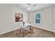 Bedroom with modern white desk, neutral carpet, and ample natural light at 3040 Varcroft Rd, Knightdale, NC 27545