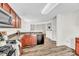 Kitchen with wood cabinets and granite countertops that opens to the living space at 3040 Varcroft Rd, Knightdale, NC 27545