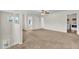 Upstairs loft space featuring neutral walls, plush carpet, and natural light at 3040 Varcroft Rd, Knightdale, NC 27545