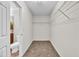 Spacious walk-in closet with carpeted floor and wire shelving for ample storage at 3040 Varcroft Rd, Knightdale, NC 27545