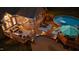 Aerial view showcasing a patio with furniture, a wooden deck, and above-ground pool at 308 Thomas Dr, Clayton, NC 27520