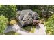 Beautiful brick home with manicured landscaping and ample parking in a lovely wooded neighborhood at 308 Thomas Dr, Clayton, NC 27520