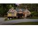 Beautiful two story home with brick facade and manicured front lawn at 308 Thomas Dr, Clayton, NC 27520