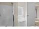 Bright bathroom featuring a shower, soaking tub, window, and toilet at 309 Coachman'S Trl, Stem, NC 27581