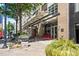 Building exterior shows covered entrance, street view, and nearby shops with sidewalk access at 319 Fayetteville St, Raleigh, NC 27601