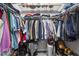 Walk-in closet with custom shelving and clothing racks for optimal storage and organization at 319 Fayetteville St, Raleigh, NC 27601
