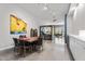 Spacious living area featuring modern decor and a glass-enclosed workspace, creating a versatile living space at 319 Fayetteville St, Raleigh, NC 27601