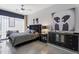 Tastefully decorated main bedroom features a statement headboard, modern artwork, and comfortable furnishings at 319 Fayetteville St, Raleigh, NC 27601