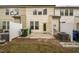 A view of a backyard patio area of a townhome complex with privacy fences at 3623 Landshire View Ln, Raleigh, NC 27616