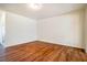 Spacious bedroom features laminate flooring and a neutral color palette, ready for personalization at 3623 Landshire View Ln, Raleigh, NC 27616