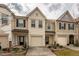 Charming townhomes featuring a private garage, complemented by well-maintained landscaping at 3623 Landshire View Ln, Raleigh, NC 27616