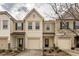 Charming townhome featuring a private garage, complemented by well-maintained landscaping at 3623 Landshire View Ln, Raleigh, NC 27616
