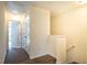 Upper hallway with neutral paint, and wood-look flooring leading to bedrooms and other living spaces at 3623 Landshire View Ln, Raleigh, NC 27616
