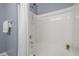 Bright bathroom featuring a white shower tub and modern fixtures at 3711 Ramblewood, Durham, NC 27713