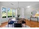 Cozy dining area featuring wood floors, stylish furnishings, and ample natural light at 3711 Ramblewood, Durham, NC 27713