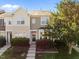 Charming townhome with well-maintained landscaping, a welcoming entrance, and sunlit facade at 3711 Ramblewood, Durham, NC 27713