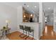Eat-in kitchen features stainless appliances, a breakfast bar with seating, and pendant lighting at 3711 Ramblewood, Durham, NC 27713
