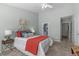Cozy main bedroom featuring a ceiling fan and an ensuite bathroom at 3711 Ramblewood, Durham, NC 27713
