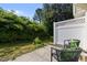 Outdoor patio with privacy fence and comfortable seating, overlooking a lush garden for serene outdoor enjoyment at 3711 Ramblewood, Durham, NC 27713