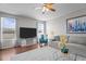 Inviting living room featuring a comfortable sofa, stylish decor, and ample natural light at 3936 White Kestreg Dr Dr, Raleigh, NC 27616