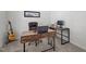 Well-lit home office with modern desk setup, comfortable seating, and ample workspace at 3936 White Kestreg Dr Dr, Raleigh, NC 27616