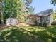 Spacious backyard features a screened-in porch and outdoor shed at 404 Woodstar Dr, Cary, NC 27513