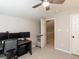 Bedroom with gray walls, neutral carpet, desk, ceiling fan, and good light at 404 Woodstar Dr, Cary, NC 27513