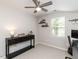 Bedroom showcasing natural light, neutral carpet, desk, and ceiling fan at 404 Woodstar Dr, Cary, NC 27513