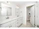 Bathroom with double vanity, quartz countertop and large mirrors at 407 Carolina Ave, Raleigh, NC 27606
