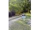 Private driveway marked with a restricted access sign, surrounded by green foliage at 4117 Stansted Dr, Fuquay Varina, NC 27526