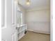 Walk-in closet with organized shelving and natural light from a window at 4117 Stansted Dr, Fuquay Varina, NC 27526