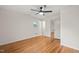 Bedroom featuring hardwood floors and a ceiling fan at 413 Winterlochen Rd, Raleigh, NC 27603