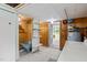 A utility room with an open doorway to the outside of the home at 413 Winterlochen Rd, Raleigh, NC 27603