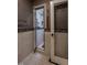Modern bathroom featuring a glass shower door and tiled accents at 4143 Gardenlake Dr, Raleigh, NC 27612