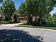 Beautiful single-Gathering home with a well-manicured lawn, mature trees, and attached two-car garage at 4143 Gardenlake Dr, Raleigh, NC 27612